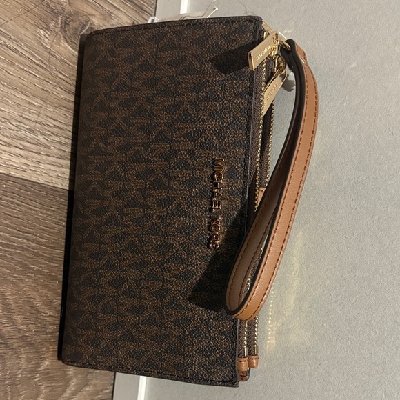 Michael Kors Handbags - Michael Kors Dark Brown Monogram Wristlet